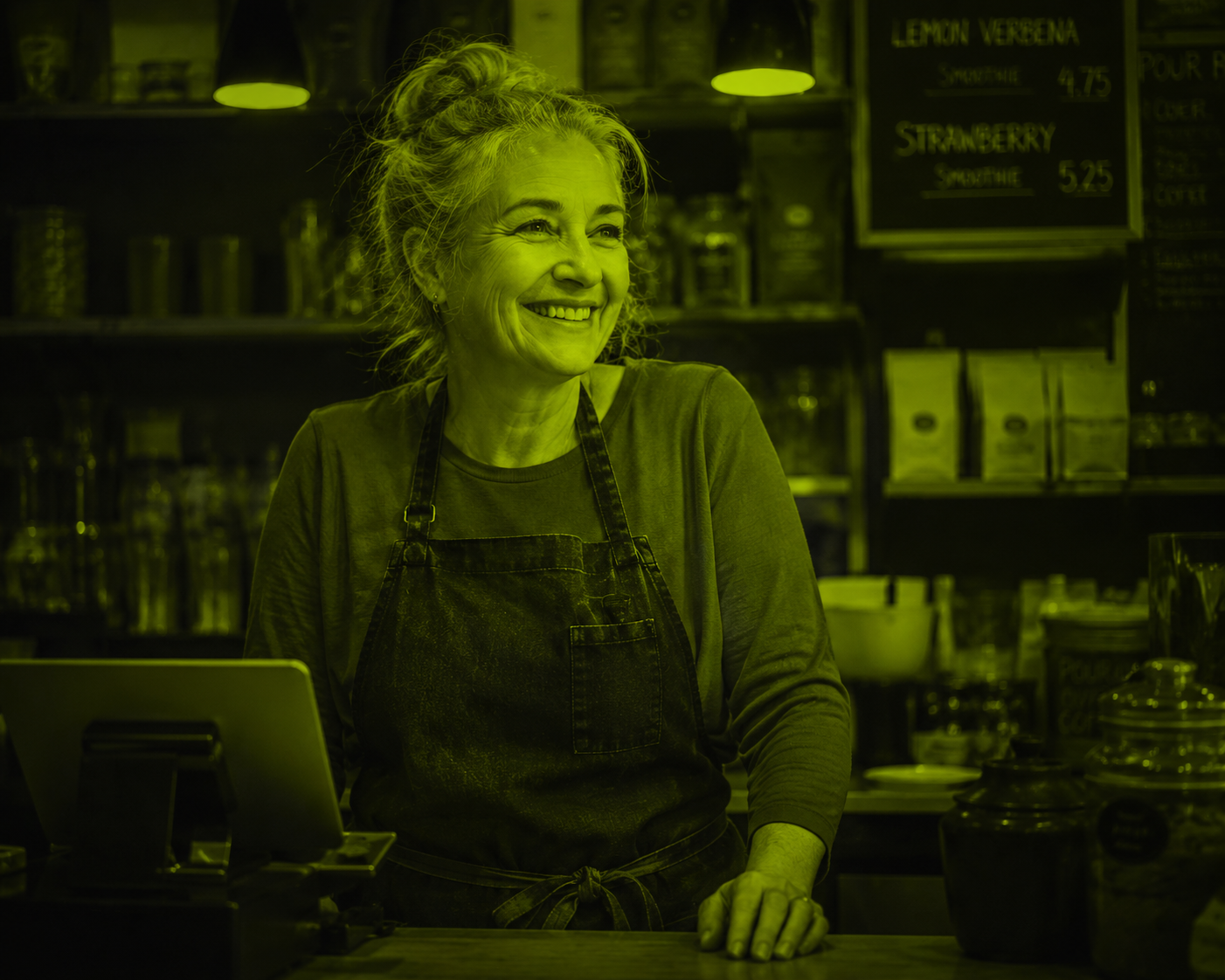 A small-shop owner behind the counter